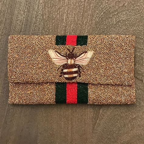 beaded gucci bee clutch|Gucci handbags for women.